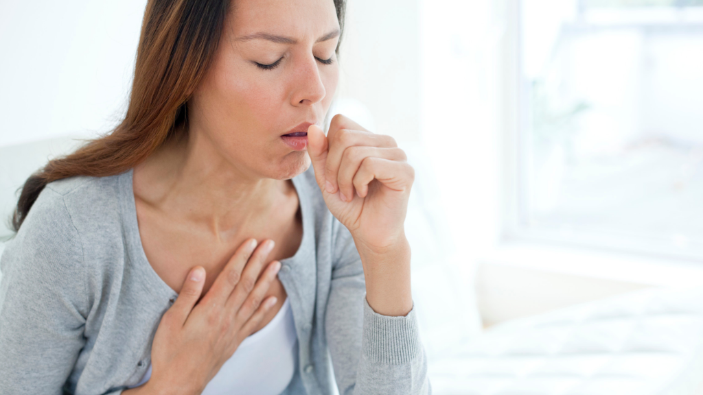 Woman coughing