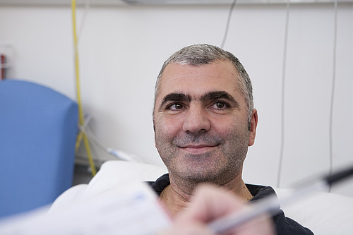 Man taking part in bowel screening process.