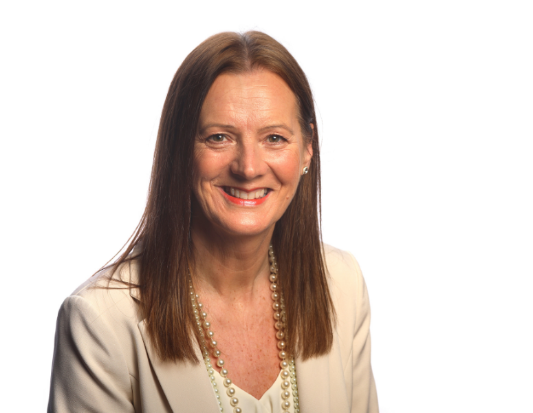 Head and shoulders photo of Maggie Pavlou against a white background.