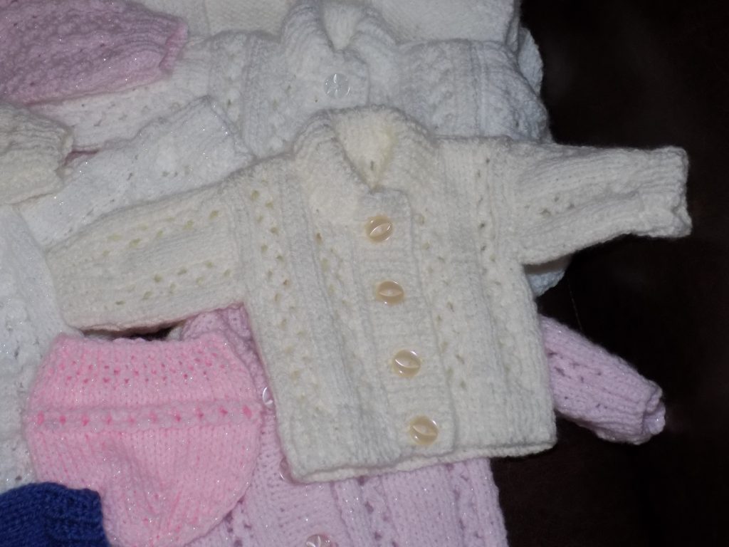 A picture of one of the baby cardigans.