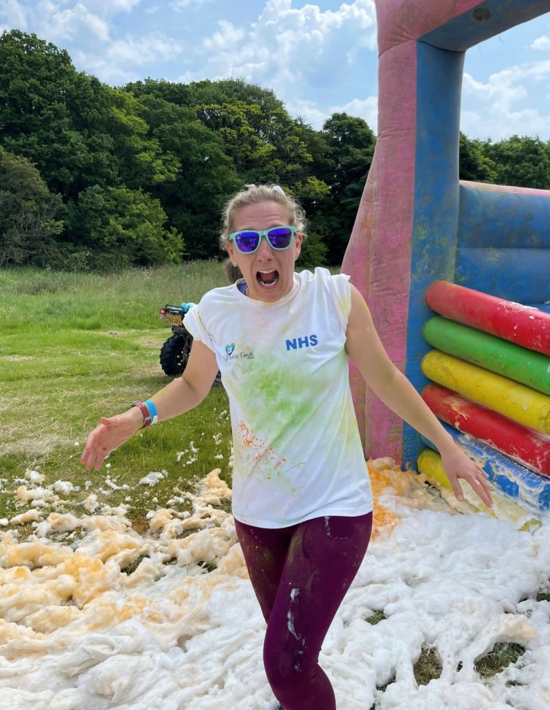 a member of St Bedes at the colour run.