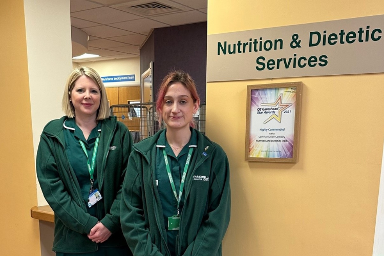 Abi and Emma outside the nutrition and dietetics service