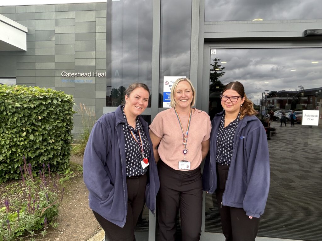 Three members of reception staff