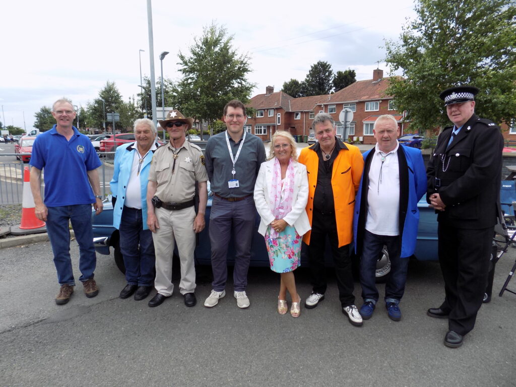 group photo of classic cars