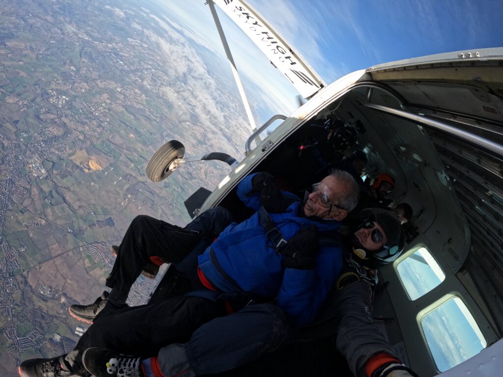 man about to skydive out of a plane