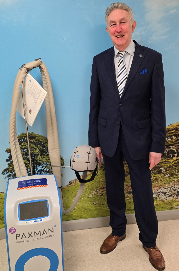 Brian Denton next to the Paxman machine