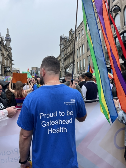 Group marching at pride