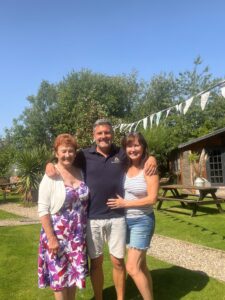 Group shot photo of three people at the Gables glamping site