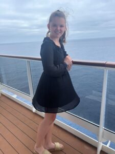 Full length photo of Eva, one of our young Charity runners