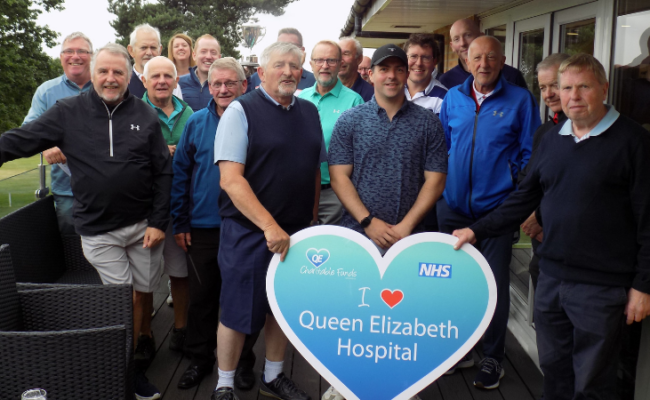 Picture of people having completed the golf day for the charity