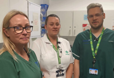 Three pharmacists stood together.
