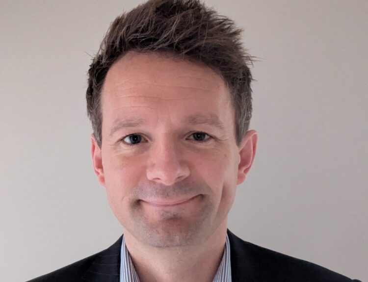 A head shot photo of Barry Dent