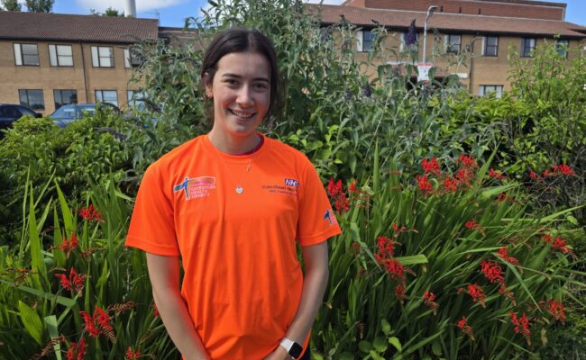 Lilly Alderson shows off our Great North Run 2026 running jersey