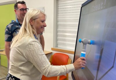 Staff replicate everyday activities on a giant interactive touchscreen to support rehabilitation goals