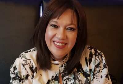 A picture of Tricia Hughes smiling