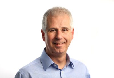 Headshot of Neil Halford against white background.