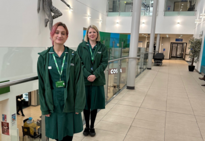 Abi and Emma inside the entrance of Queen Elizabeth Hospital in Gateshead