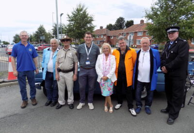 group photo of classic cars