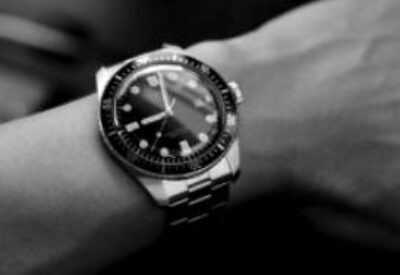 A watch on a persons arm