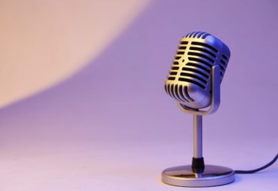 retro microphone isolated on colour background