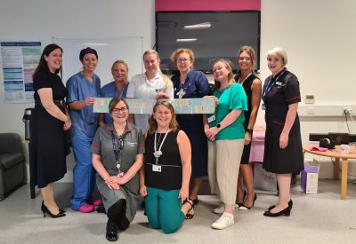 A photo of maternity staff celebrating their CQC rating